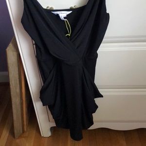 Tight fitting black dress with pockets
